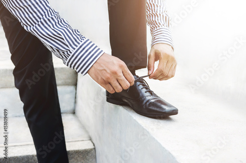 Businessman tie shoelace, Get ready for new challenge concept
