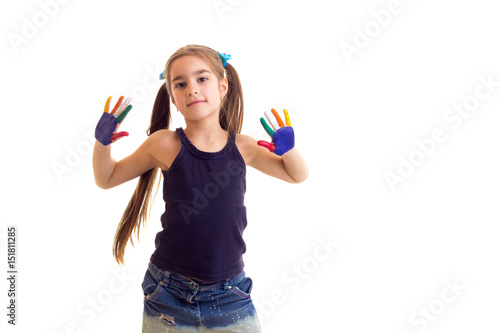 Little girl with colored hands