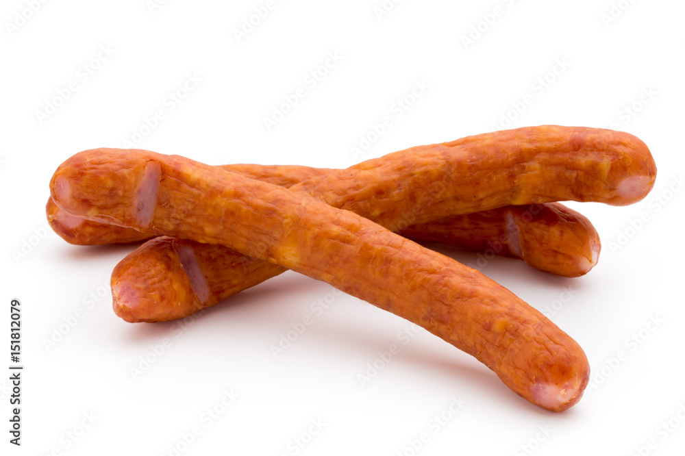 Stack of smoked sausages isolated on a white background. Stack of smoked sausages isolated on a white background.