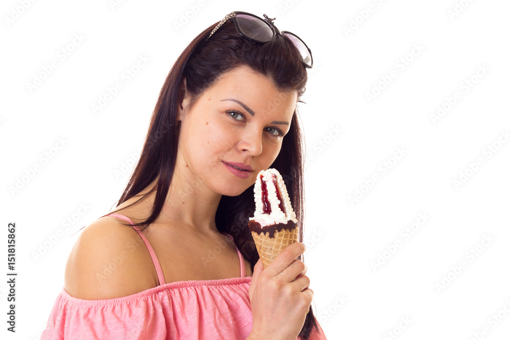 Woman in dress with sunglasses holding ice-cream Woman in dress with sunglasses holding ice-cream