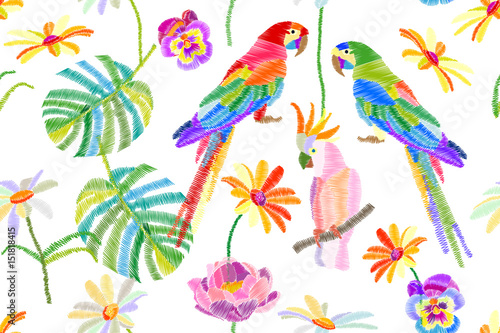 Tropical summer. Seamless vector pattern with parrots, flowers and palm leaves on white background.