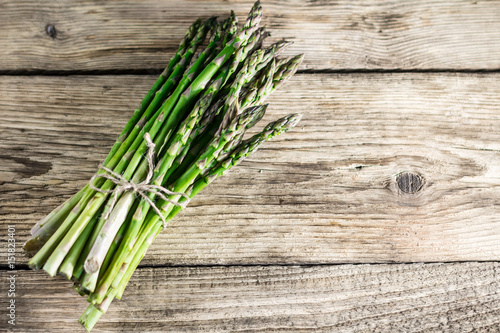 Asparagus  on vintage wooden background. place for text