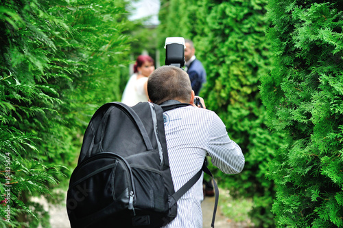 Photographer photographing a just married couple © Mihai