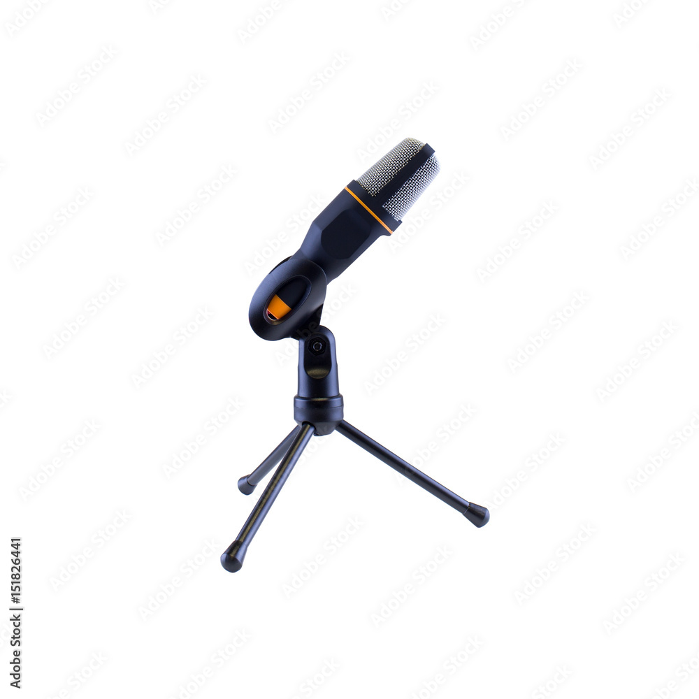 A professional studio broadcasting / recording cardioid condenser microphone mounted on a mini tripod on an office workspace desktop, photographed from a side view against a white background. A professional studio broadcasting / recording cardioid condenser microphone mounted on a mini tripod on an office workspace desktop, photographed from a side view against a white background.