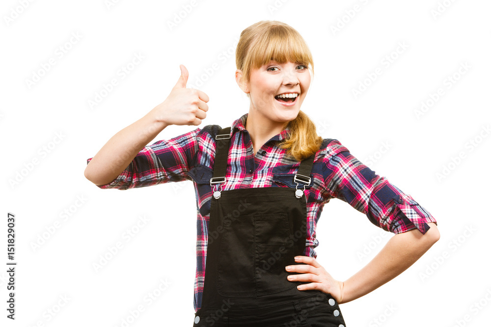 Woman in dungarees showing thumb up Woman in dungarees showing thumb up