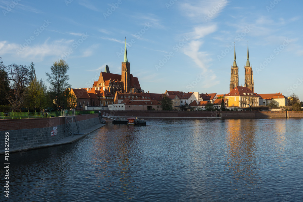 Cathedral Island with Cathedral of St. John and church of the Holy Cross and St. Bartholomew at sunset in Wroclaw, Poland