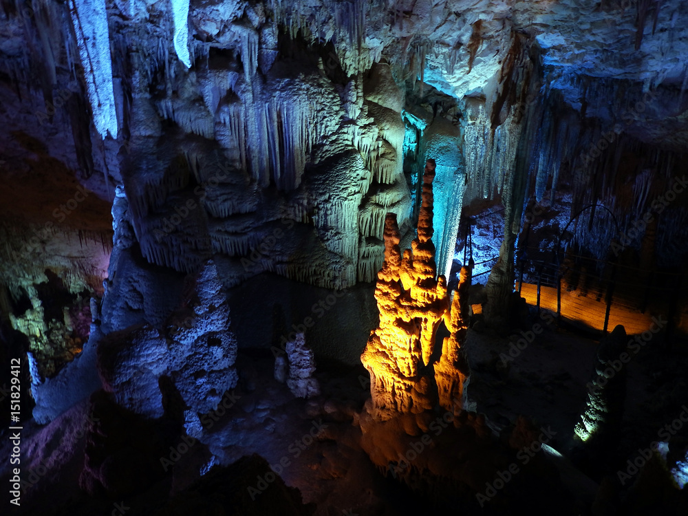Geological formation underground. Stalactite cave.