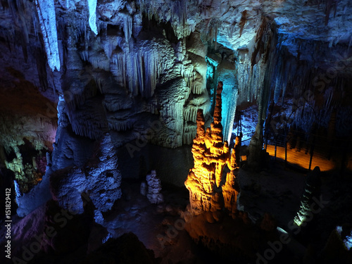 Geological formation underground. Stalactite cave.