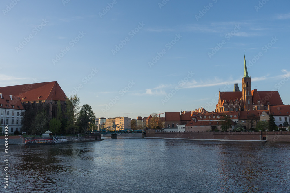 Cathedral of St. John and Ostrow Tumski bridge at sunset in Wroclaw, Poland