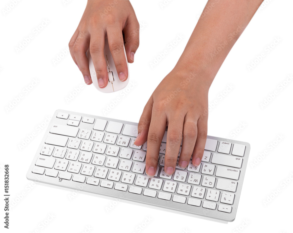 Woman working at home office hand on keyboard on white background Woman working at home office hand on keyboard on white background