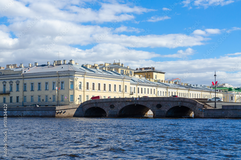View from Neva River to Prachechnyy Bridge across Fontanka River, St. Petersburg, Russia