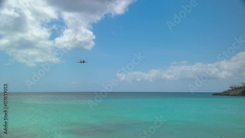 Philipsburg St. Maarten Executive Business Jet Landing at Princess Juliana International Airport SXM Over People on Maho Beach during a Sunny Day in the Caribbean