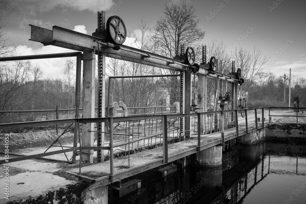 Small dam on Oredezh River, monochrome