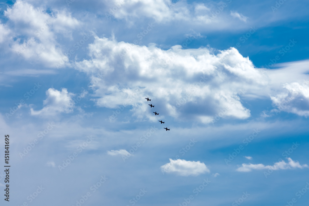 Combat aircraft perform aerial aerobatics in the sky Combat aircraft perform aerial aerobatics in the sky