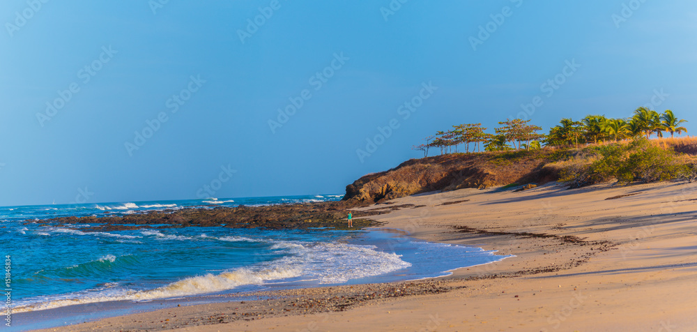 Obraz premium Guanacaste, Costa Rica - April 5, 2017: Beautiful Playa Mansita beach and oceanscape at low tide. This location is a development of Hacienda Pinilla and use by guests of the JW Marriott Guanacaste 