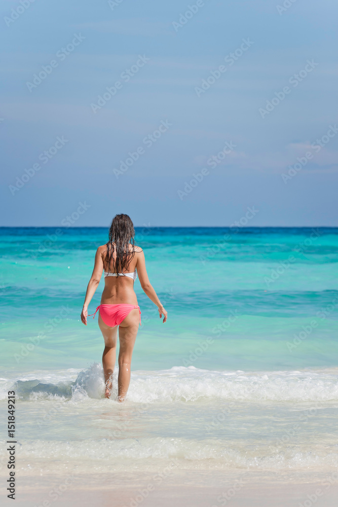 Young woman in ocean