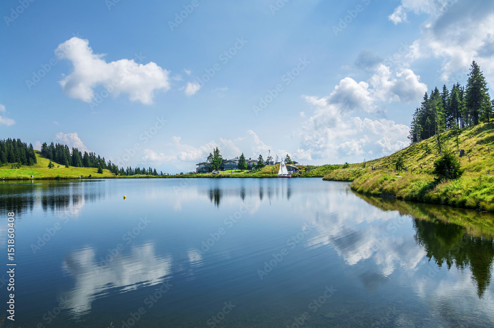 Fototapeta premium Hintersteinersee mountain lake, summer wellness attraction in Scheffau am Wilden Kaiser, Tirol, Austria