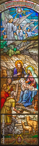 TURIN, ITALY - MARCH 16, 2017: The Adoration of Shepherds in the stained glass of church Chiesa di San Massimo designed by prof. Mario Barbieris.