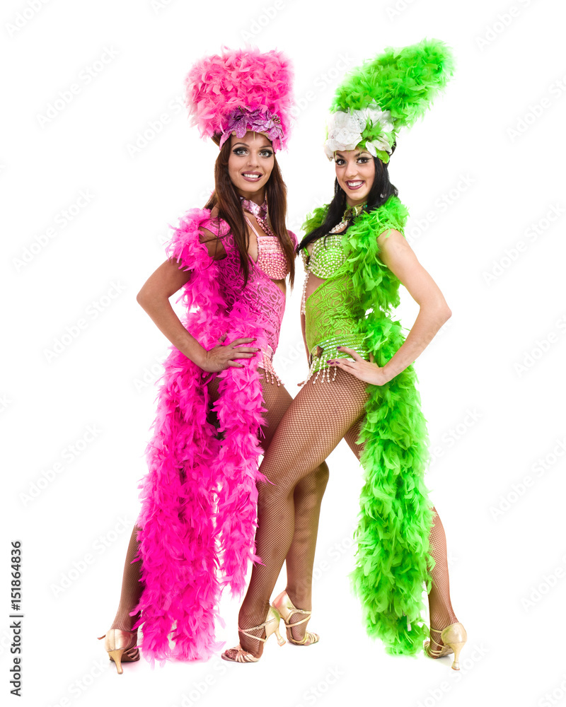 two carnival dancer women dancing against isolated white background two carnival dancer women dancing against isolated white background