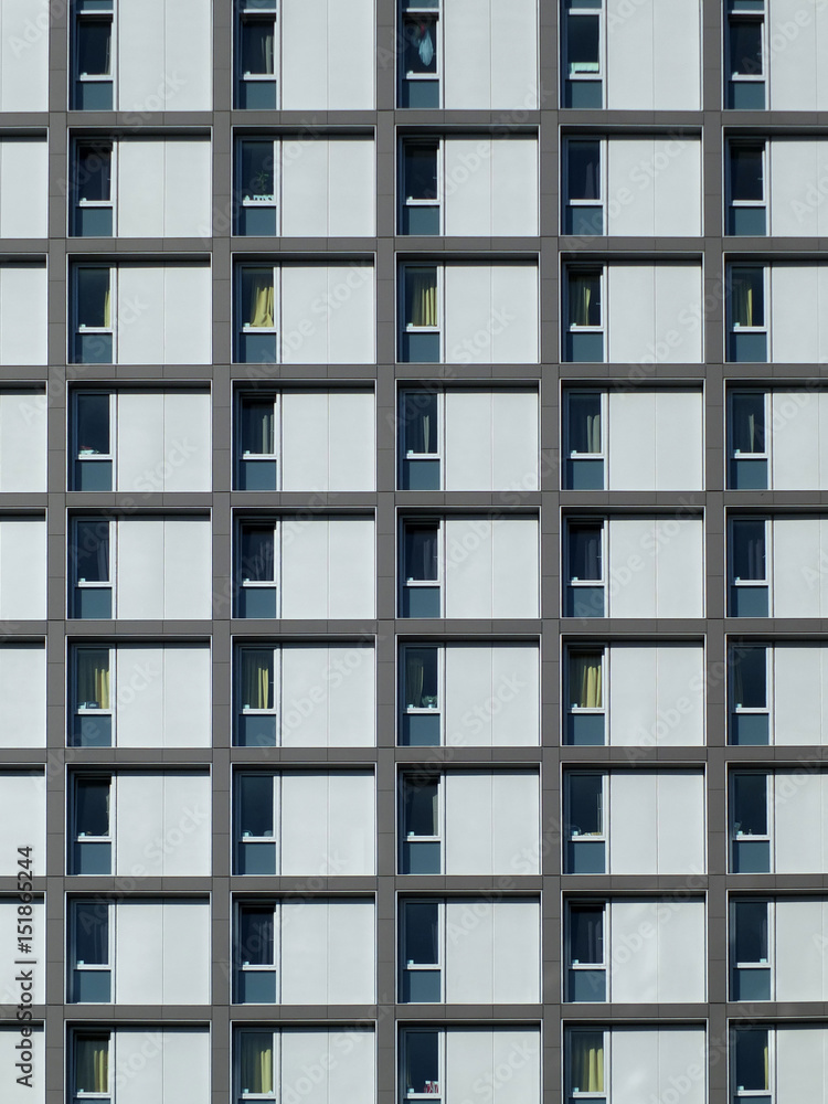 Obraz premium modern housing development with repeating pattern windows