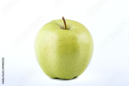 a green apple on the white background