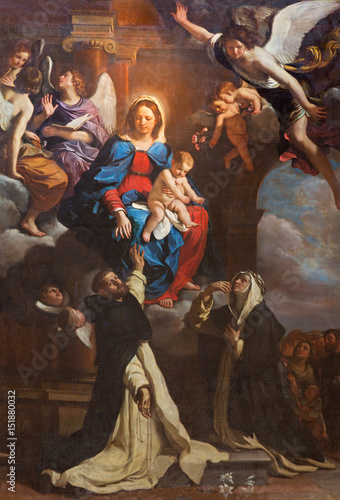 TURIN, ITALY - MARCH 14, 2017: The Painting of Madonna with the St. Dominic and St. Catherine in church Chiesa di San Domenicoby Giovanni Francesco Barbieri (1635).