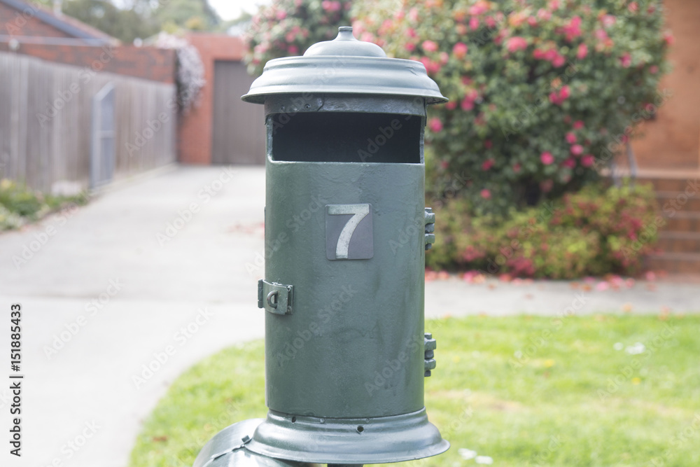 Green house mailbox number seven. Green house mailbox number seven.
