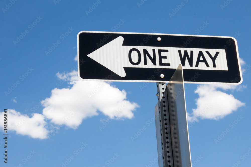 Fototapeta premium One way sign against blue sky