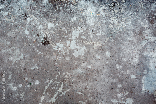 Spot of grey paint on the asphalt road