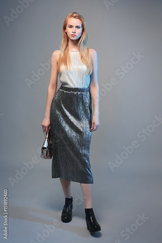 Beautiful young woman on co...