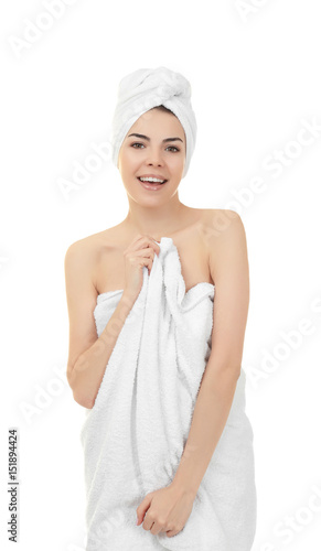 Beautiful young woman after shower on white background