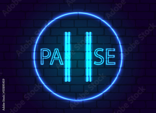 A neon sign in button pause,on the background of a brick wall.