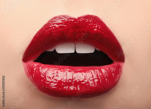 Woman with red lips close up