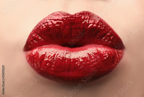 Woman with red lips close up