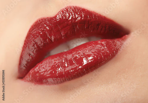 Woman with red lips close up