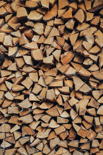Firewood. Stack of wood logs, wooden abstract background