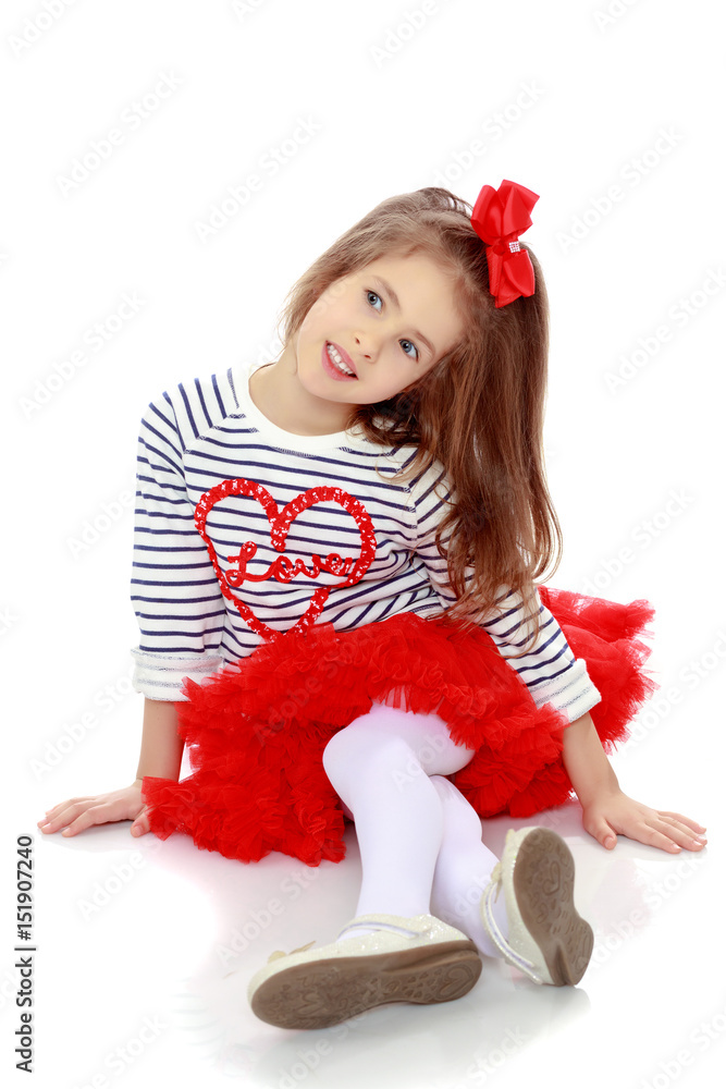 The little girl in the red skirt. The little girl in the red skirt.