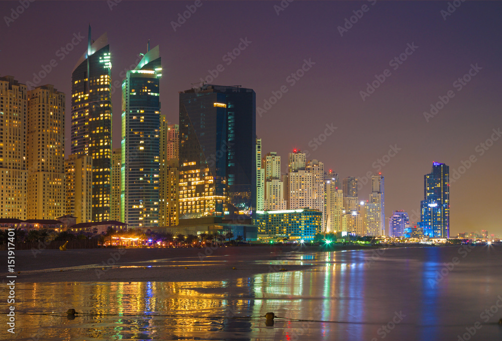 Dubai - The nightly Marina towers from beach.