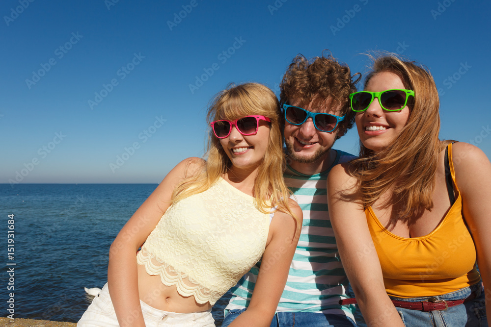 Group friends boy two girls having fun outdoor Group friends boy two girls having fun outdoor