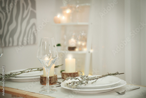 Table setting with spring decoration and candles