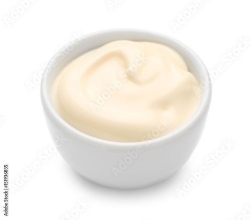 Delicious mayonnaise in bowl isolated on white