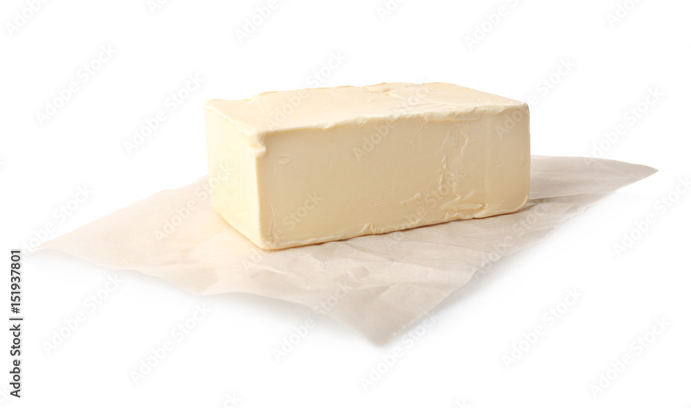 Delicious butter piece on white background, closeup