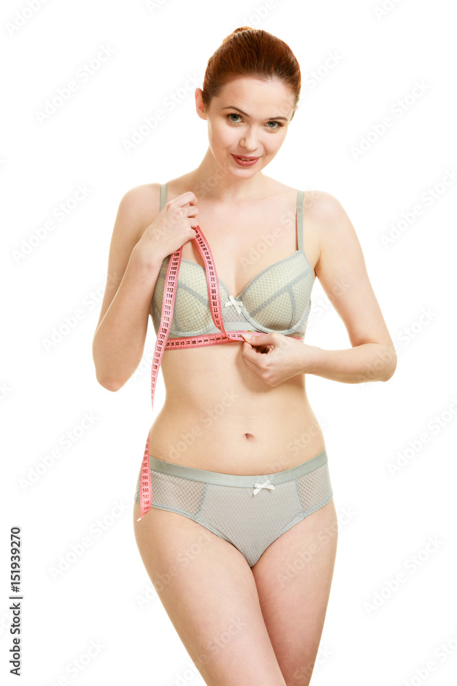Obraz premium Woman measuring her under breasts.