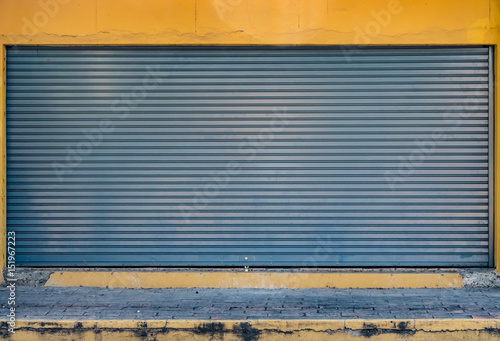 Old gray roller shutter door