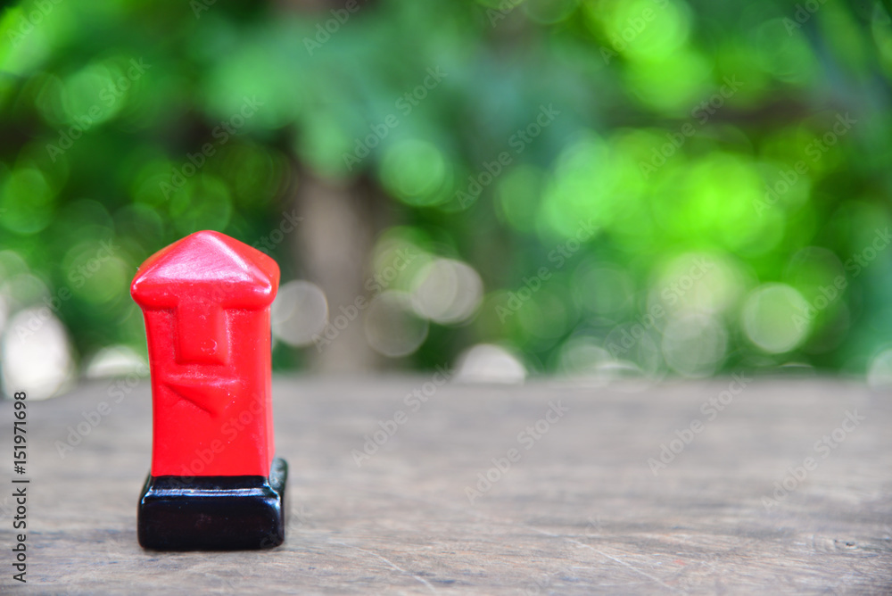 red mail box on green nature background. red mail box on green nature background.