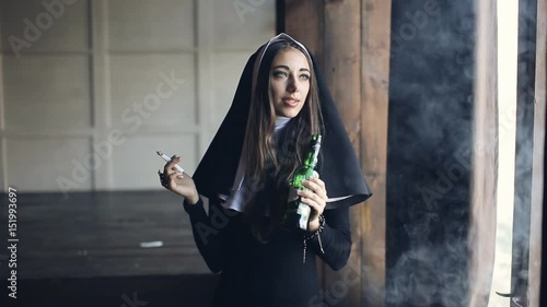 bad nun drinks alcohol and smokes