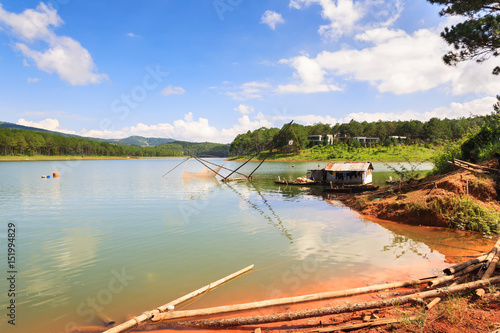 Fishing net in Tuyen Lam lake in Dalat, Lam Dong, Vietnam. Tuyen Lam lake is artificial lake, 6km to the South of Dalat, has the water surface of 350 hectare.