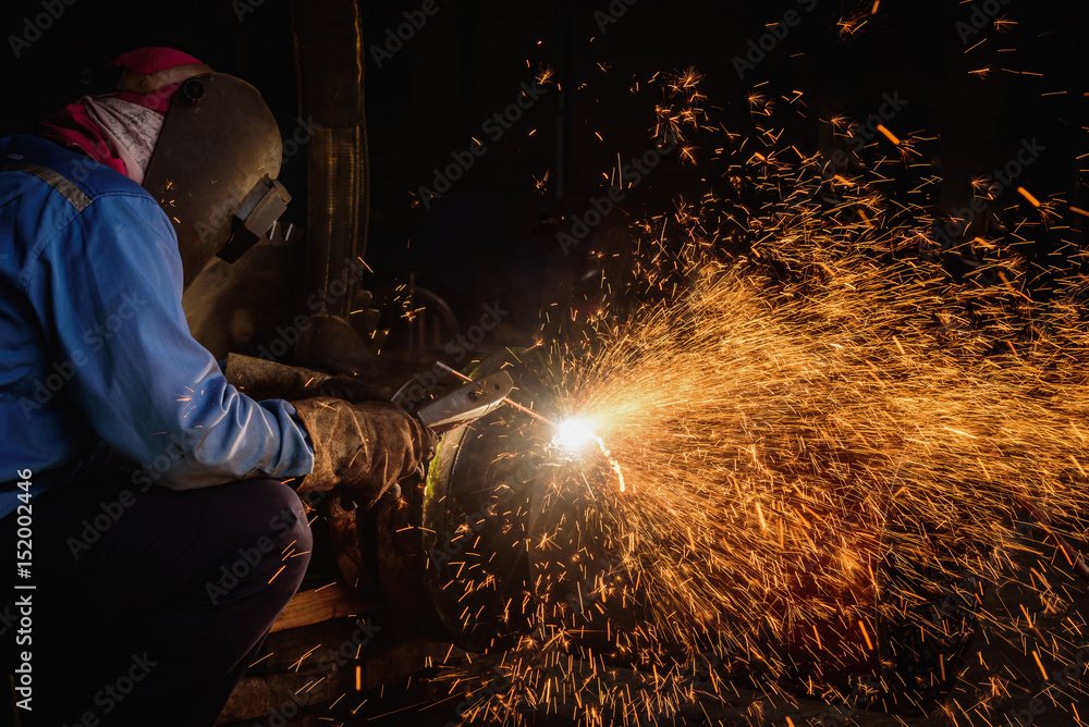 Gouging welding steel structure and bright sparks in steel construction industry. Gouging welding steel structure and bright sparks in steel construction industry.
