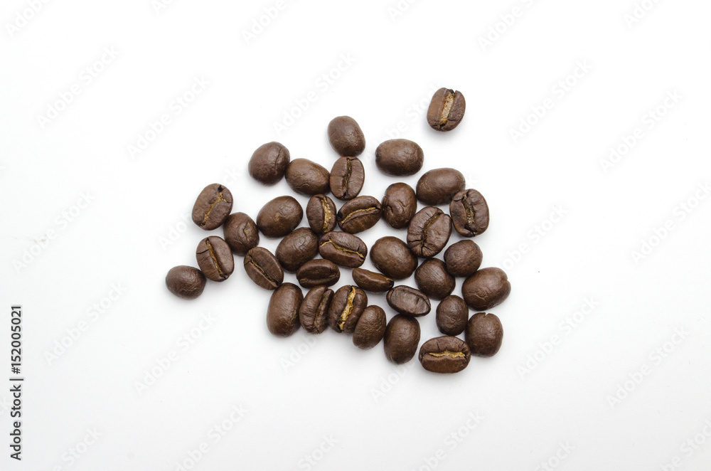 The top view of coffee beans isolate on white background The top view of coffee beans isolate on white background