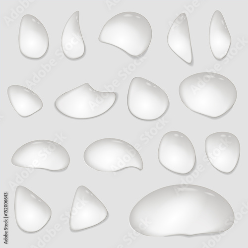 Drops of water on a transparent background. Vector.